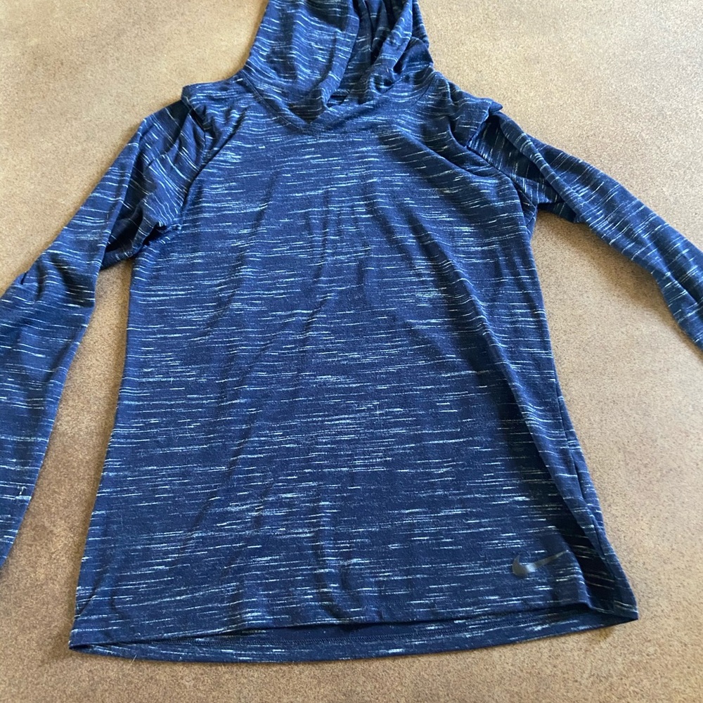 Nike pullover shirt. Never worn. Perfect condition.